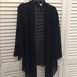 Cardigan. Black see through